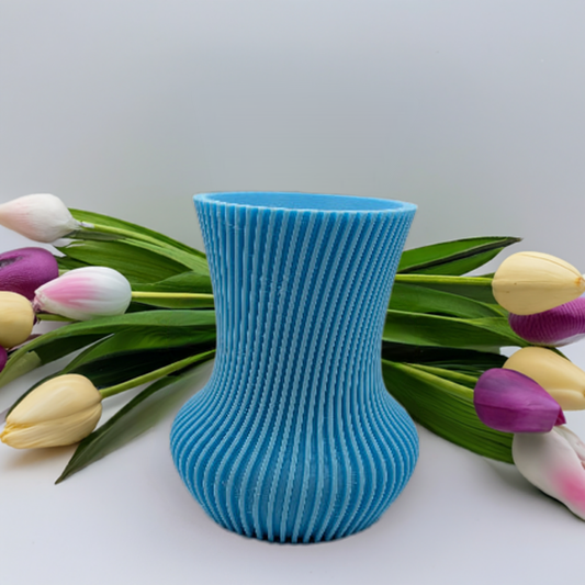 AI generated image of a blue vase in front of some tulips