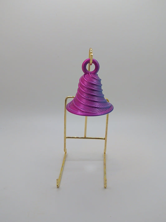 Bell with twist ornament