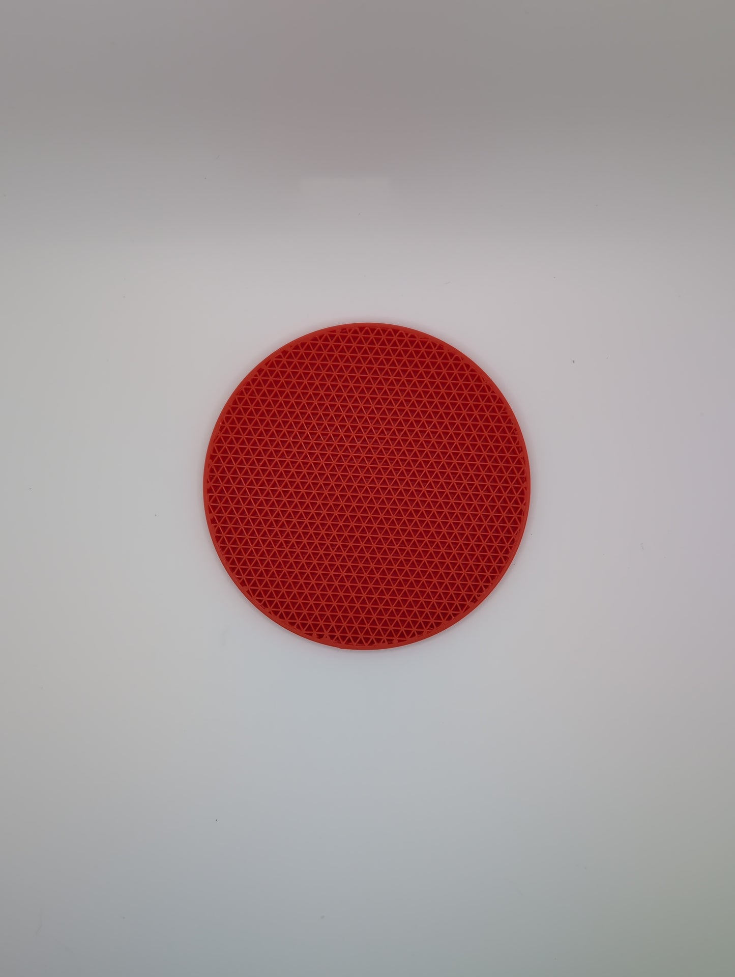 3d printed red triangle infill coaster