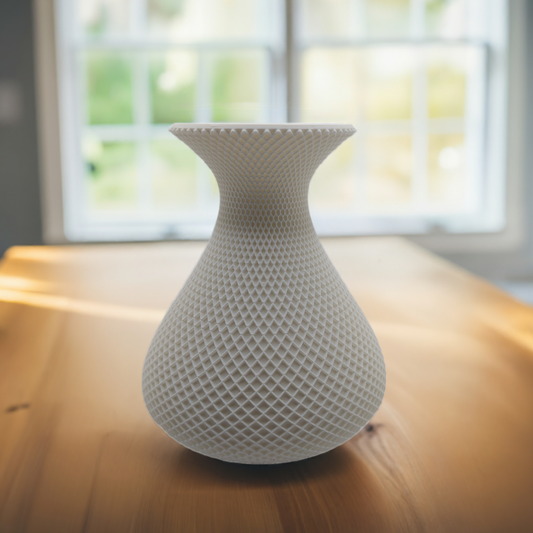 AI generated image of a white crosshatch pattern vase on a light wood table in front of a window