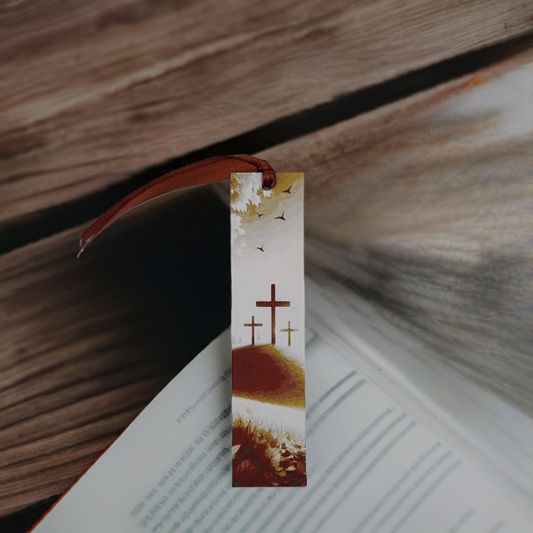 3 crosses in autumn bookmark on an open book