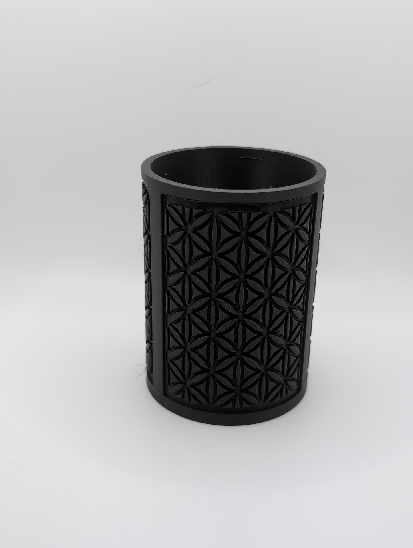 black oval flower pattern planter