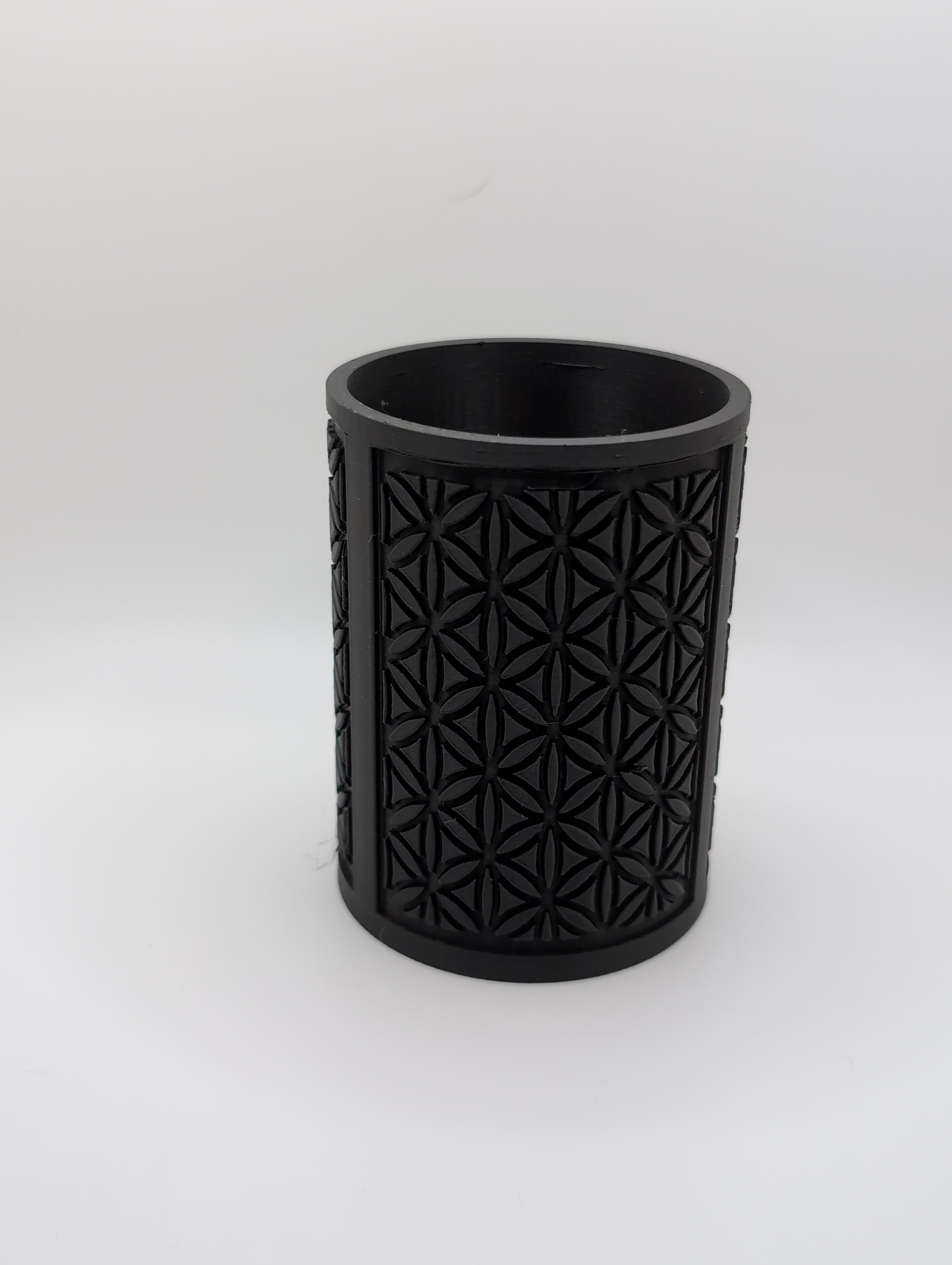 black oval flower pattern planter