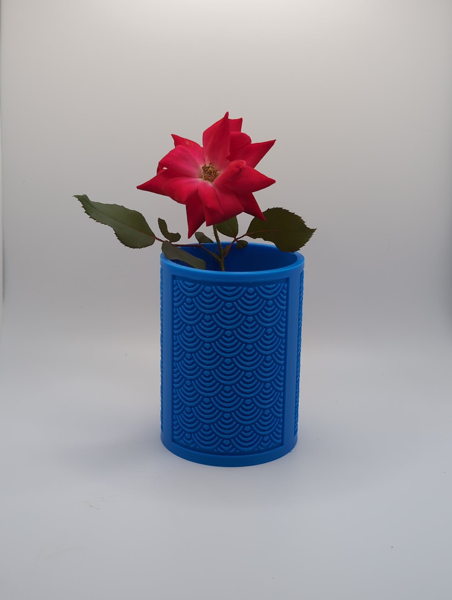 blue medium chinese arc planter with red rose
