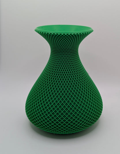 green vase with crosshatch pattern