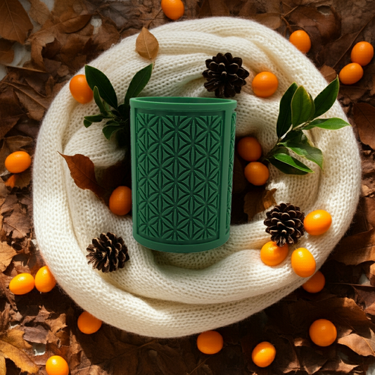 green oval flower pattern planter with pine cones leaves, and kumquats around a white scarf-AI generated