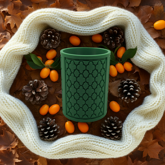 green rose pattern planter with pine cones leaves, and kumquats around a white scarf-AI generated