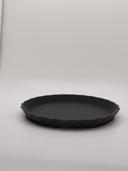 black patterned plate