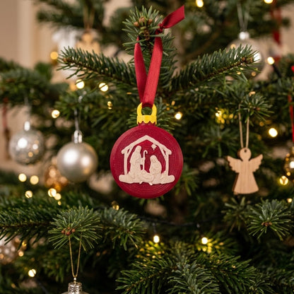 Red Christmas ornament with nativity