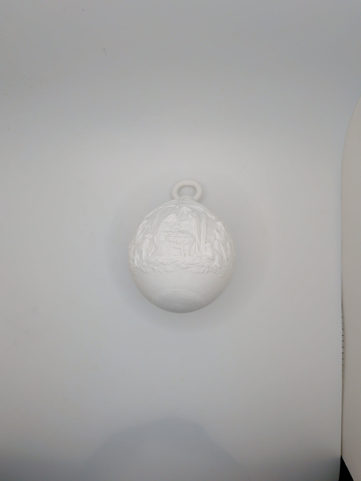 White christmas bauble with nativity