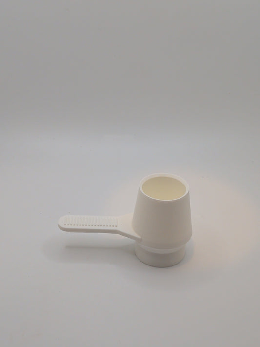 Coffee scoop with tamper