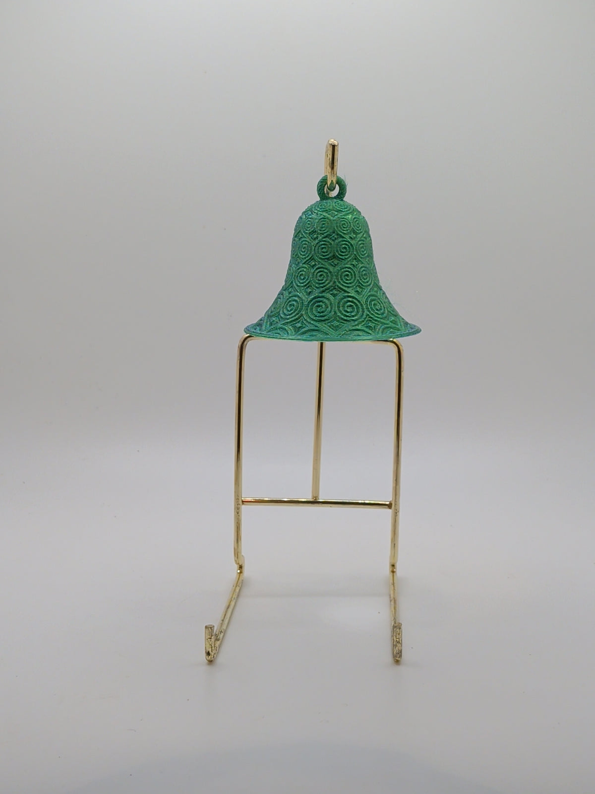 Bell with spiral ornament
