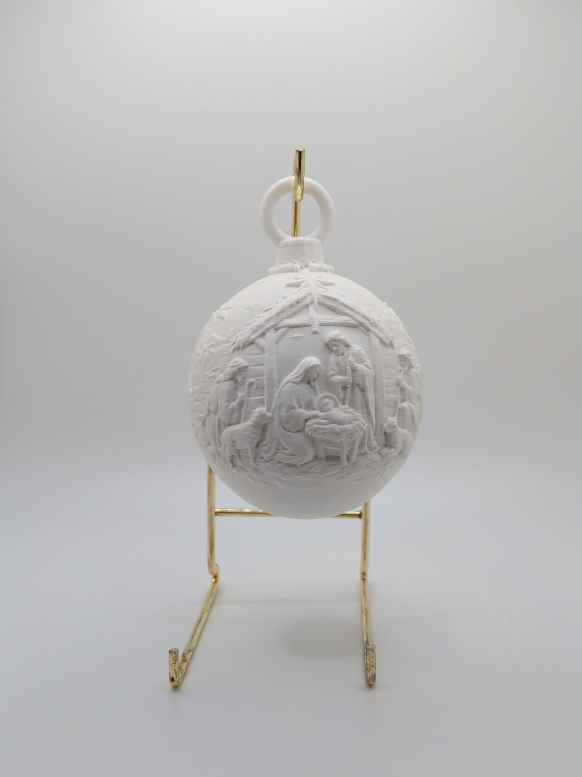 White christmas bauble with nativity