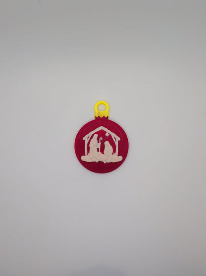 Red Christmas ornament with nativity