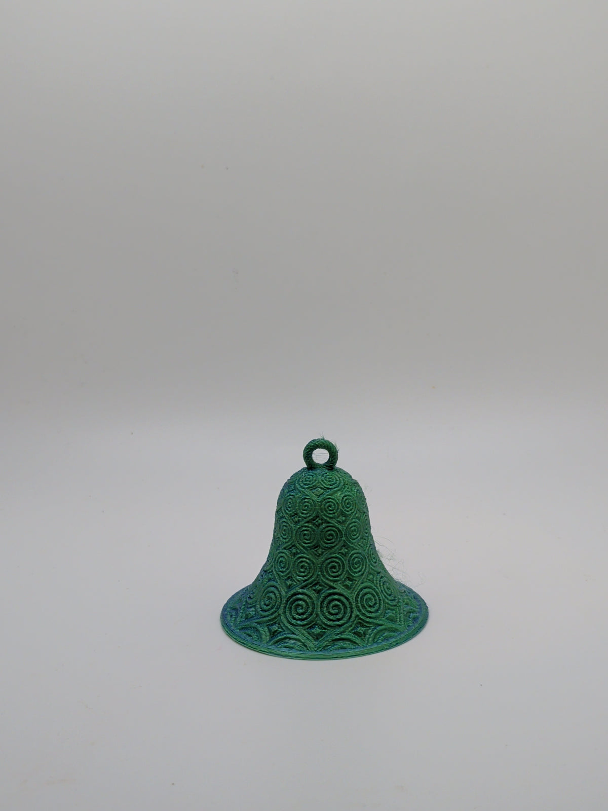Bell with spiral ornament