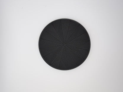 3d printed black star spiral infill coaster