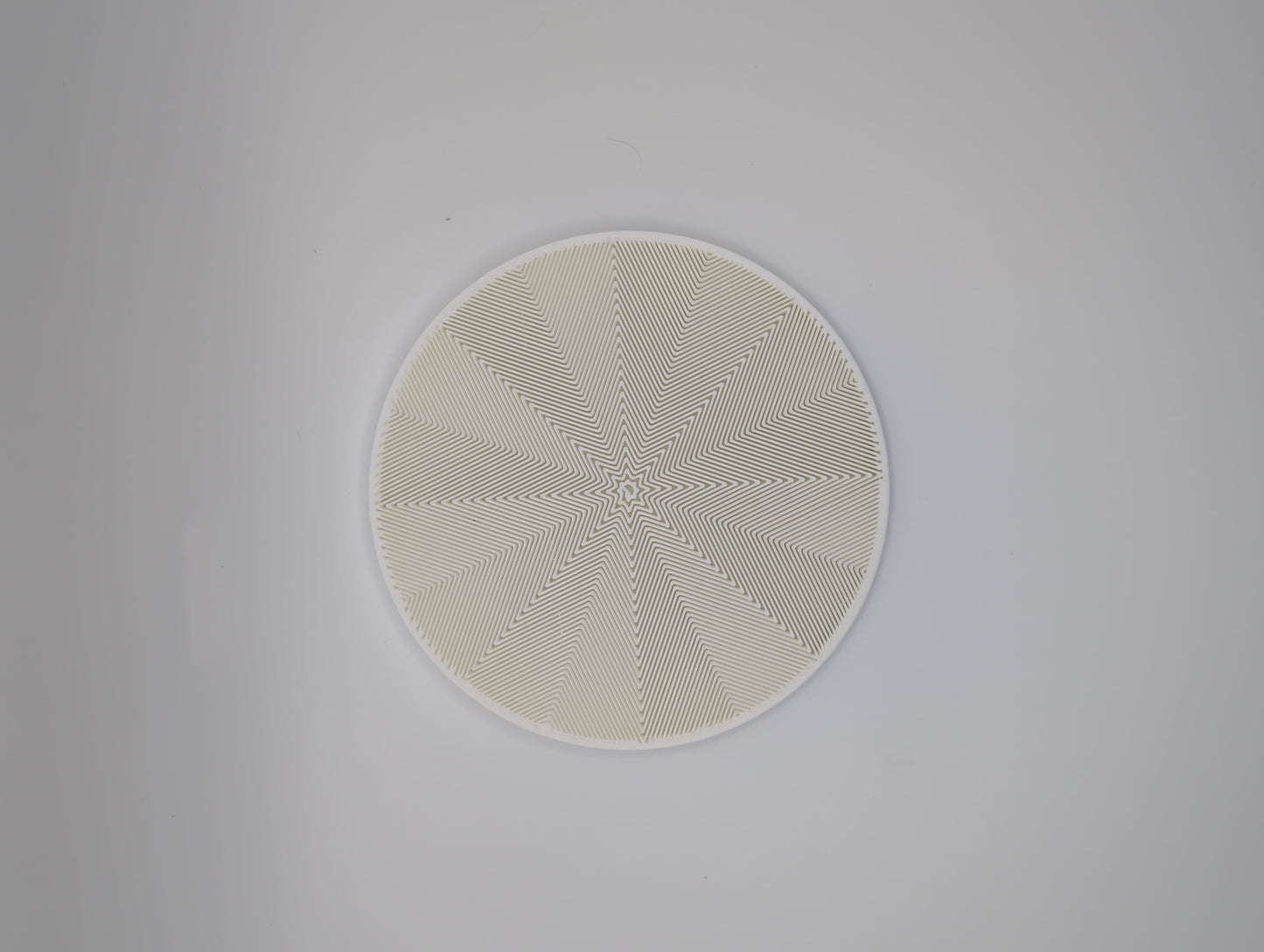 3d printed white star spiral infill coaster