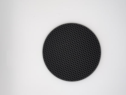 3d printed black tr-hexagon infill coaster