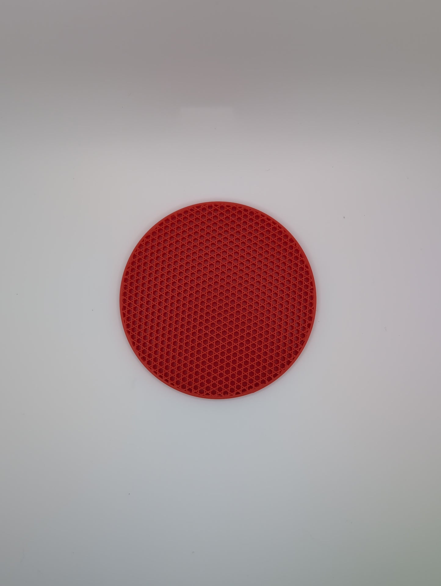 3d printed red tri-hexagon infill coaster