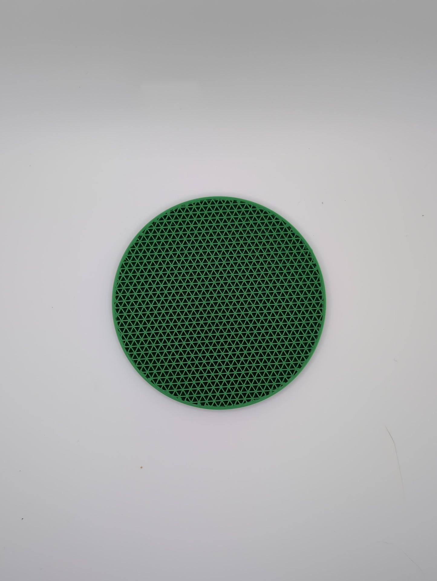 3d printed green triangles infill coaster