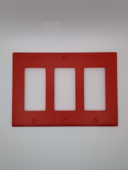 red triple light switch cover with maze pattern